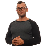 Man wearing Ermenegildo Zegna Black Men Glasses Frame, showcasing full-rim plastic with trapezium style and spring hinge for men.