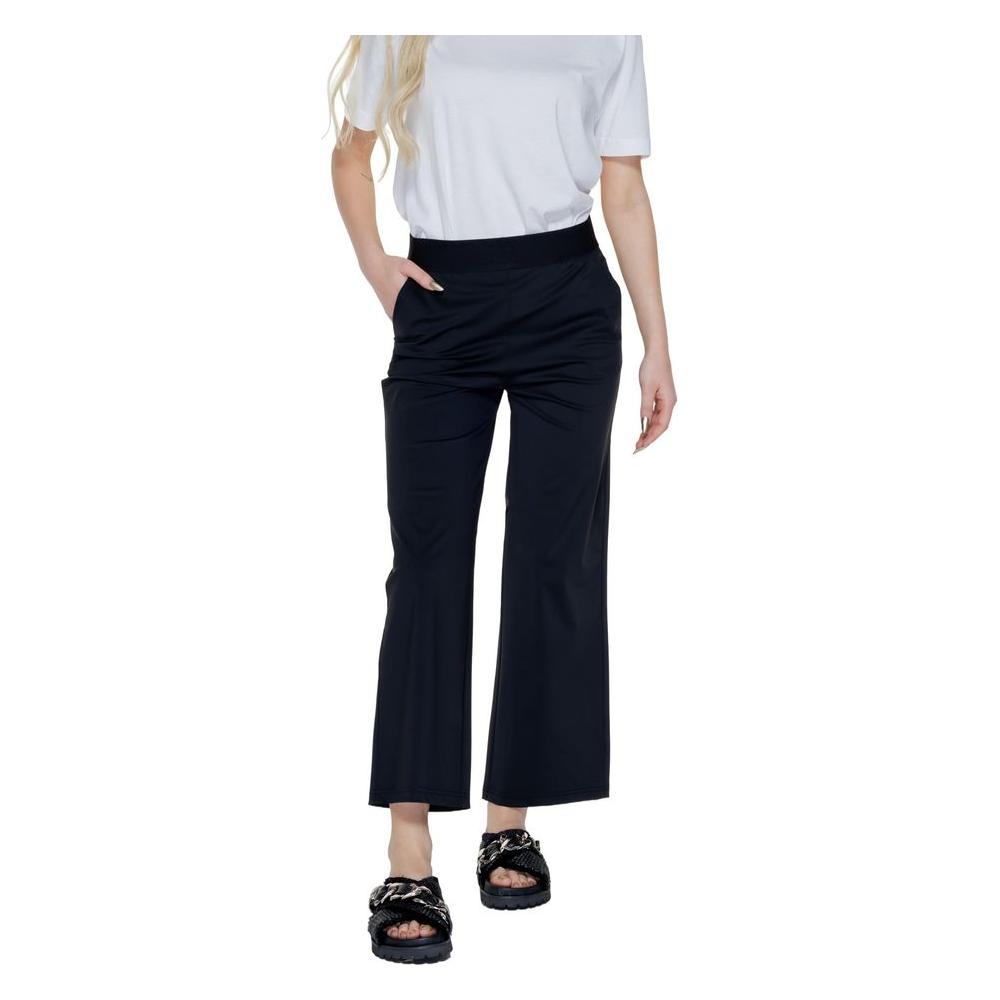 Woman wearing Street One black polyamide palazzo pants, spring/summer collection.