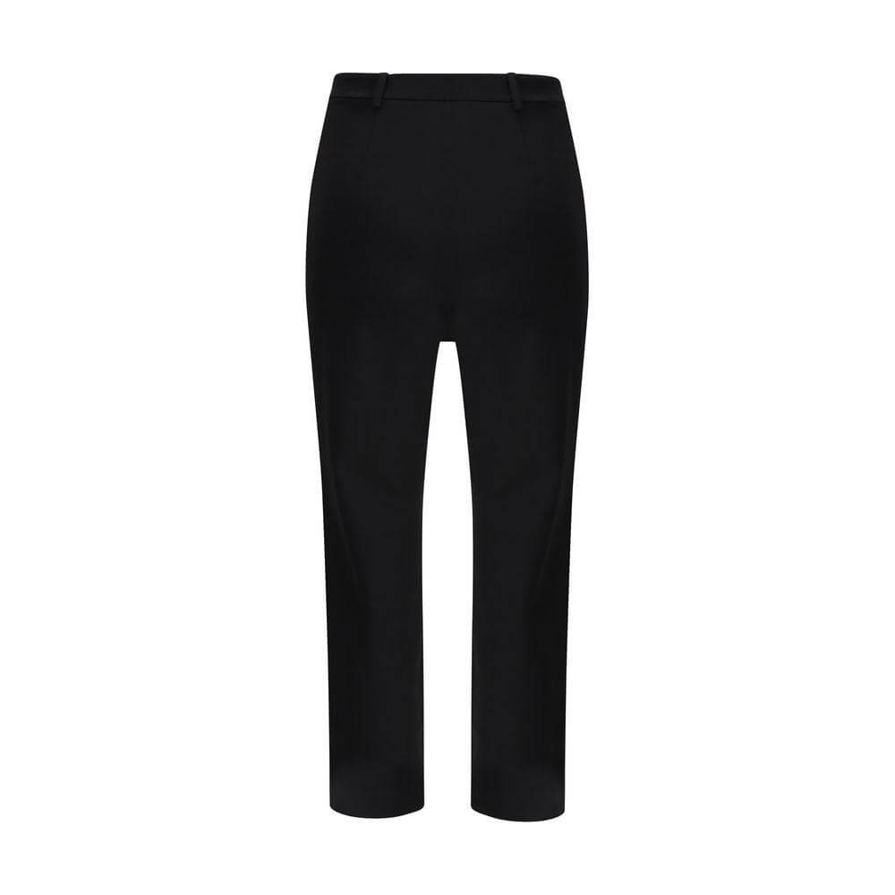 The Andamane boot-cut pants in black with zipper and button closure, featuring two front welt pockets and a regular fit.