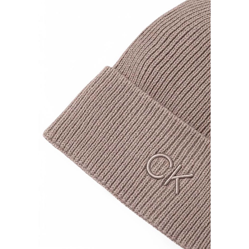 Calvin Klein Beige Organic Cotton Cap (Baseball Hat) featuring CK embroidery on ribbed design for style and warmth.