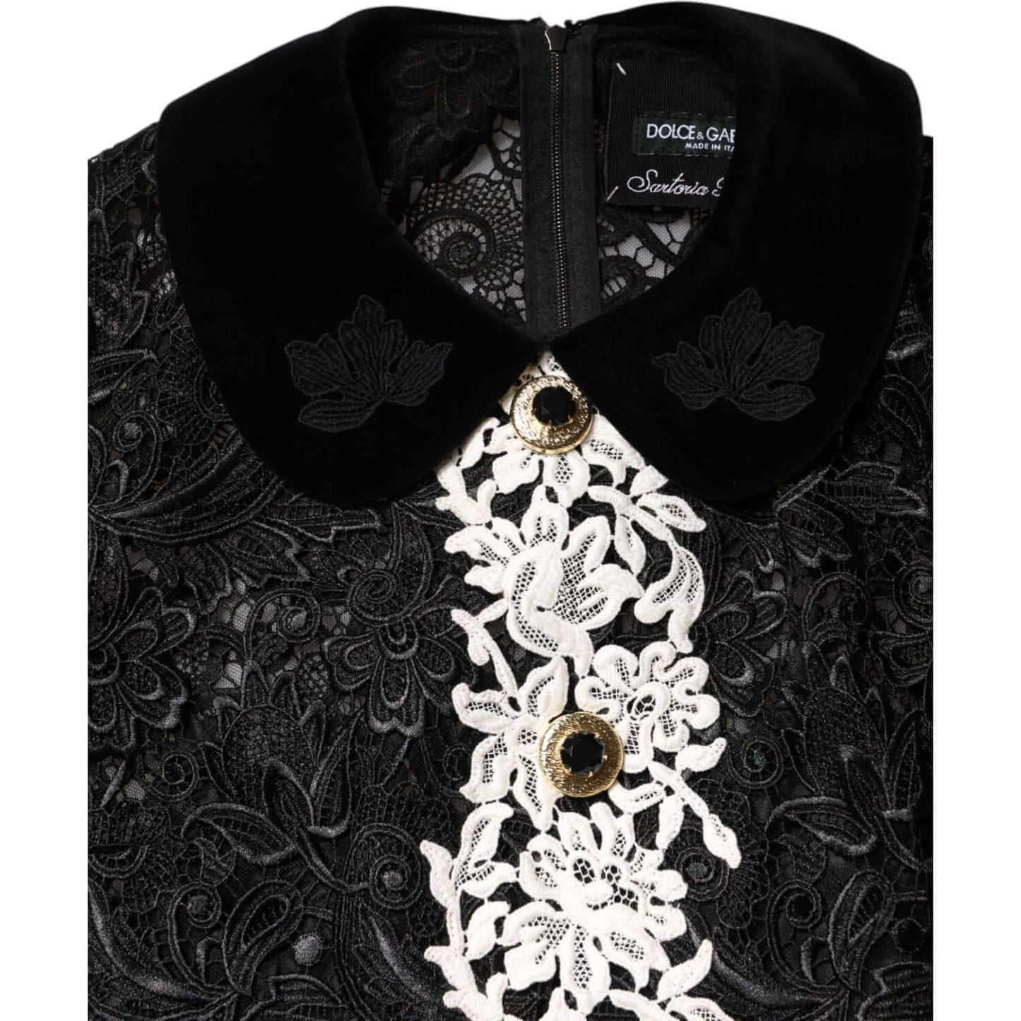 Dolce & Gabbana black floral lace embellished mini dress with zipper closure and logo details, featuring white floral accents.