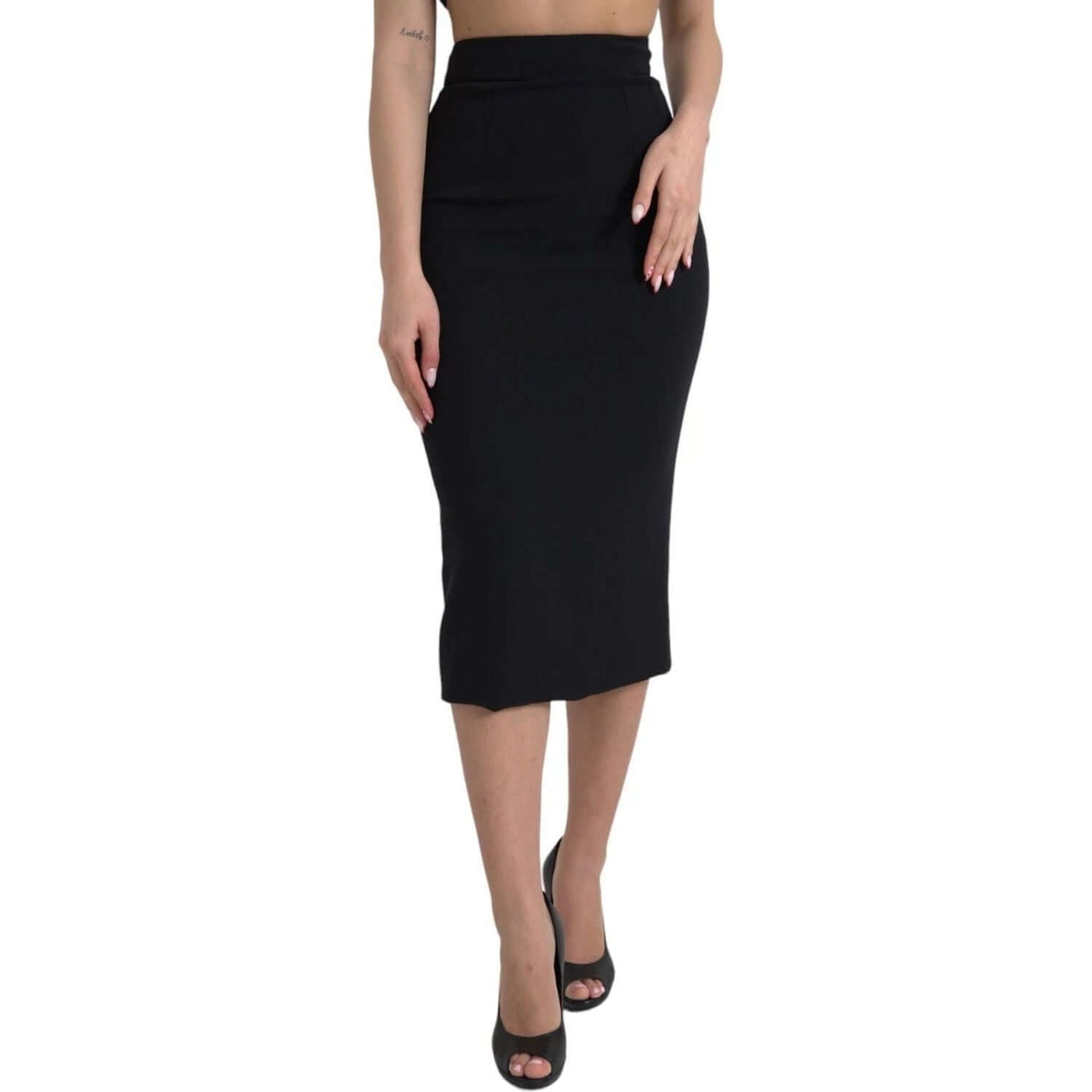 Dolce & Gabbana black wool high waist pencil midi skirt modeled, showing sleek front design, perfect for parties, Italian made.