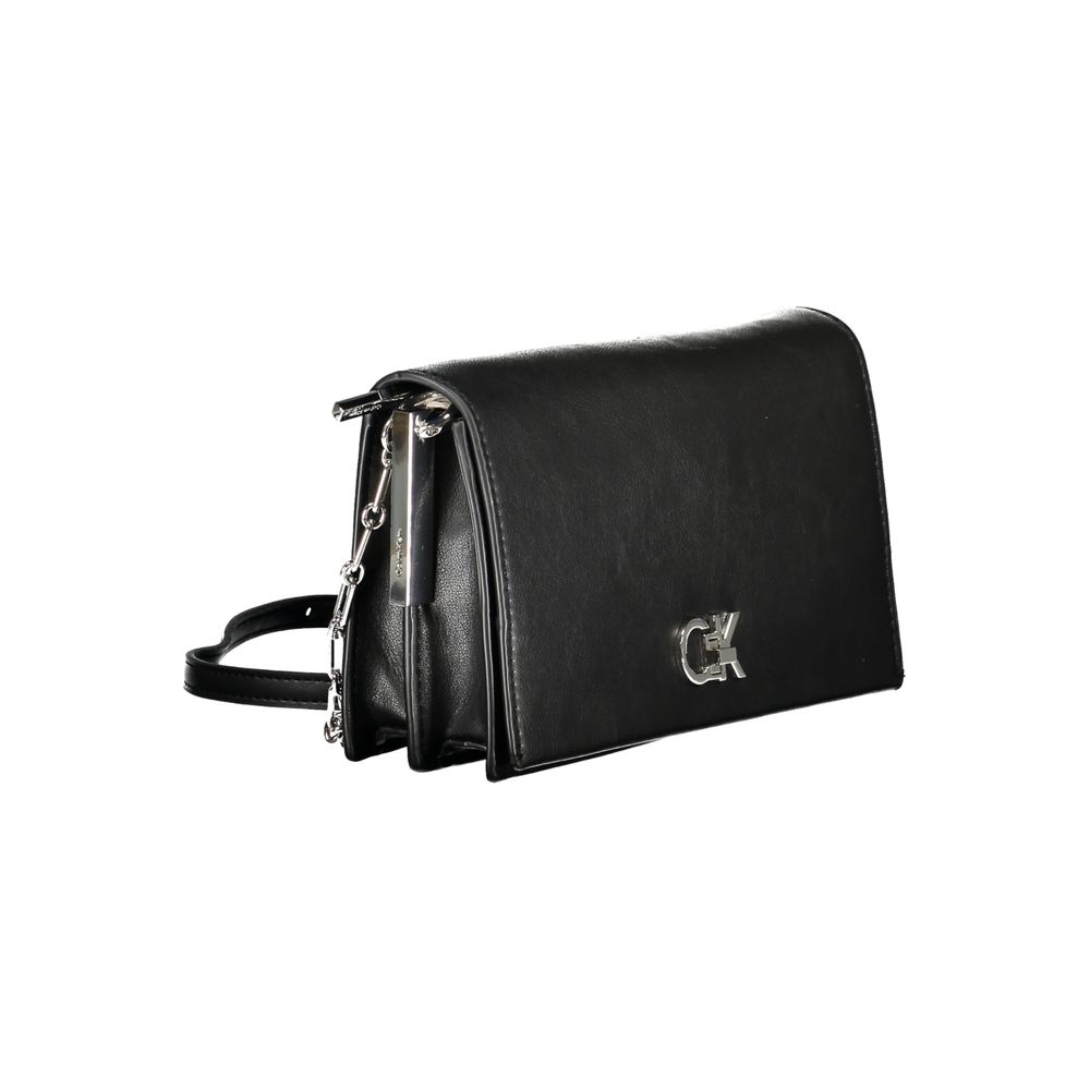 Calvin Klein Black Polyester Handbag with adjustable shoulder strap, twist closure, and logo detail.