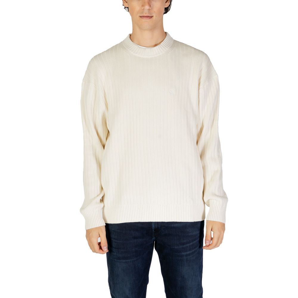 Calvin Klein Jeans Cream Cotton Sweatshirt with ribbed texture, crew neck, and elasticated cuffs for men.