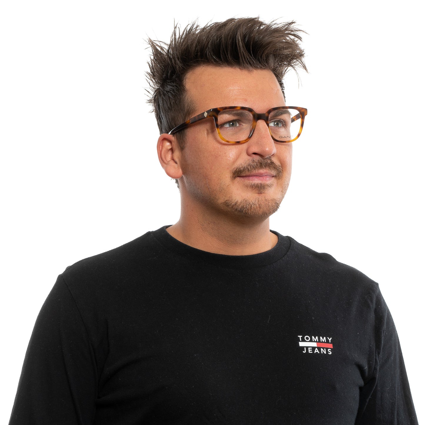 Man wearing GANT MOD. GA3208 52053 glasses, suitable for gents, styled with a Tommy Jeans shirt