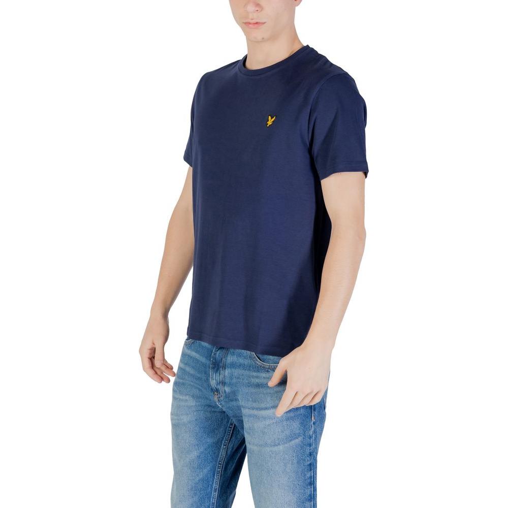 Man wearing a Lyle & Scott blue cotton T-shirt, short-sleeve design, paired with jeans, showcasing a casual look.