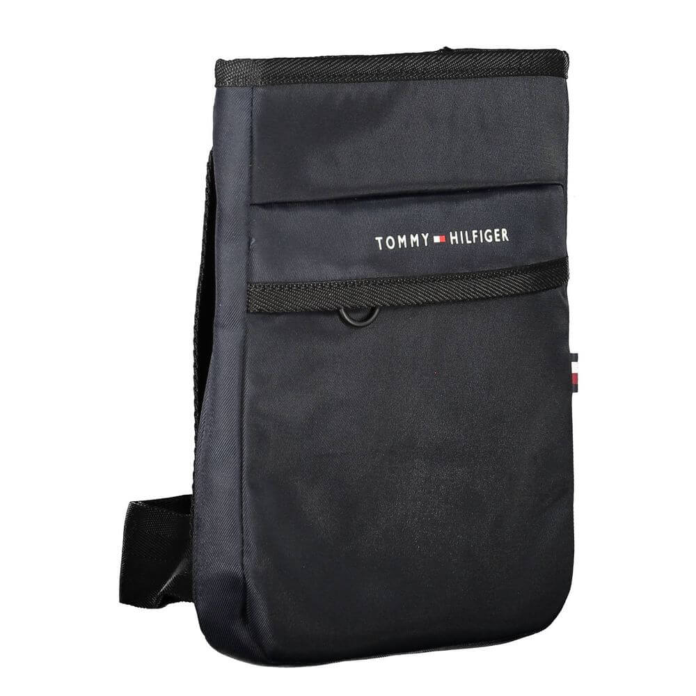 Tommy Hilfiger blue polyester men's shoulder bag with zip closure and adjustable strap, featuring brand logo and external pocket for organization.
