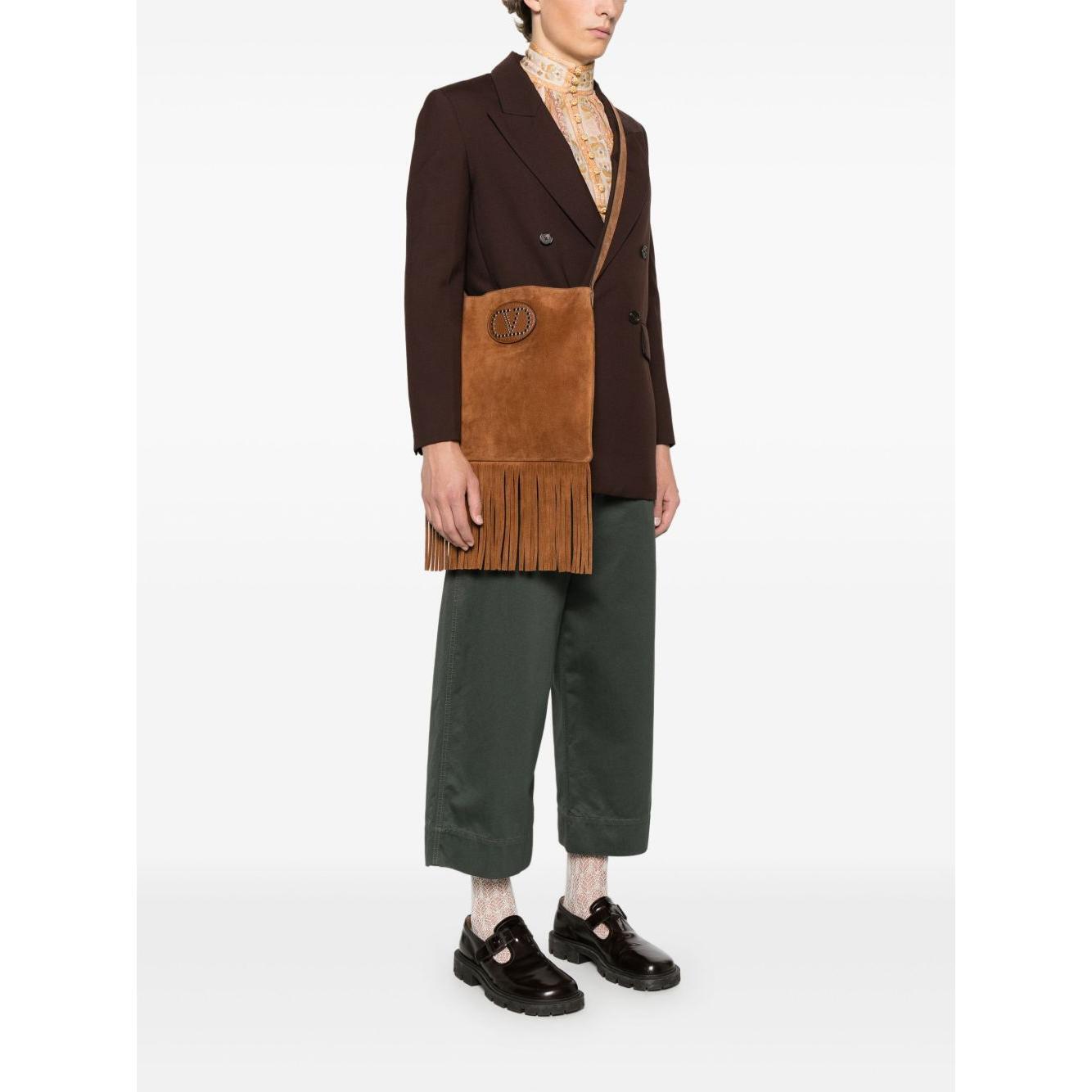 Front view with bag zipped and handles upright.