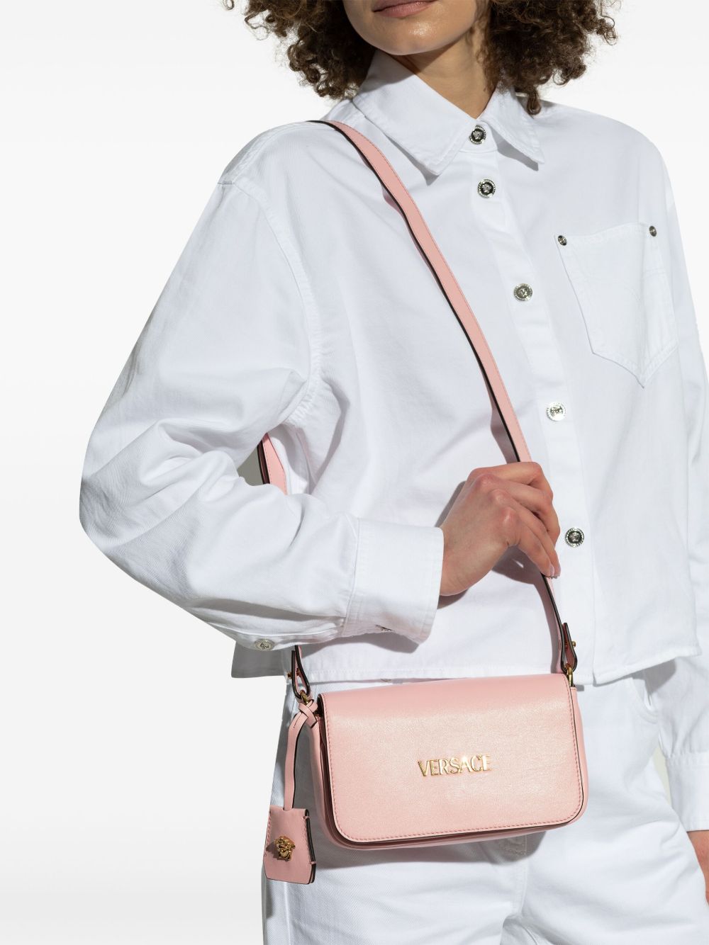 Front view with bag zipped and handles upright.