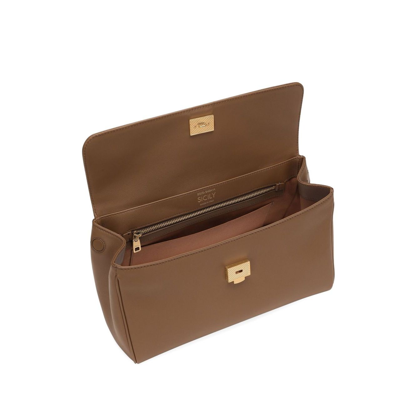Dolce & Gabbana Sicily soft leather handbag in caramel brown with foldover top and magnetic fastening, shown open to reveal interior.