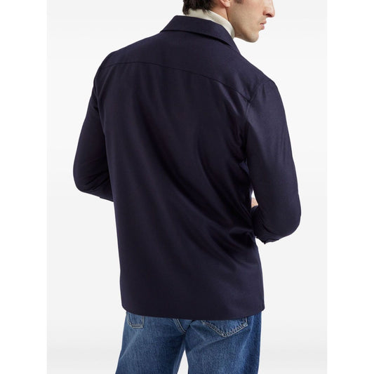Rear view of Brunello Cucinelli Shirts Blue wool shirt with long sleeves and buttoned cuffs.