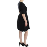 CO|TE Black short sleeve venus dress SIG12647-1
