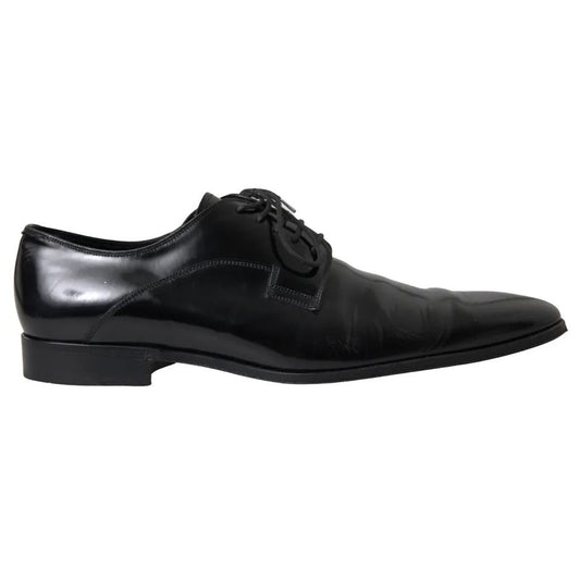 Dolce & Gabbana Black Polished Leather Formal Dress Shoes with minor wear signs, 100% leather, made in Italy, elegant design.