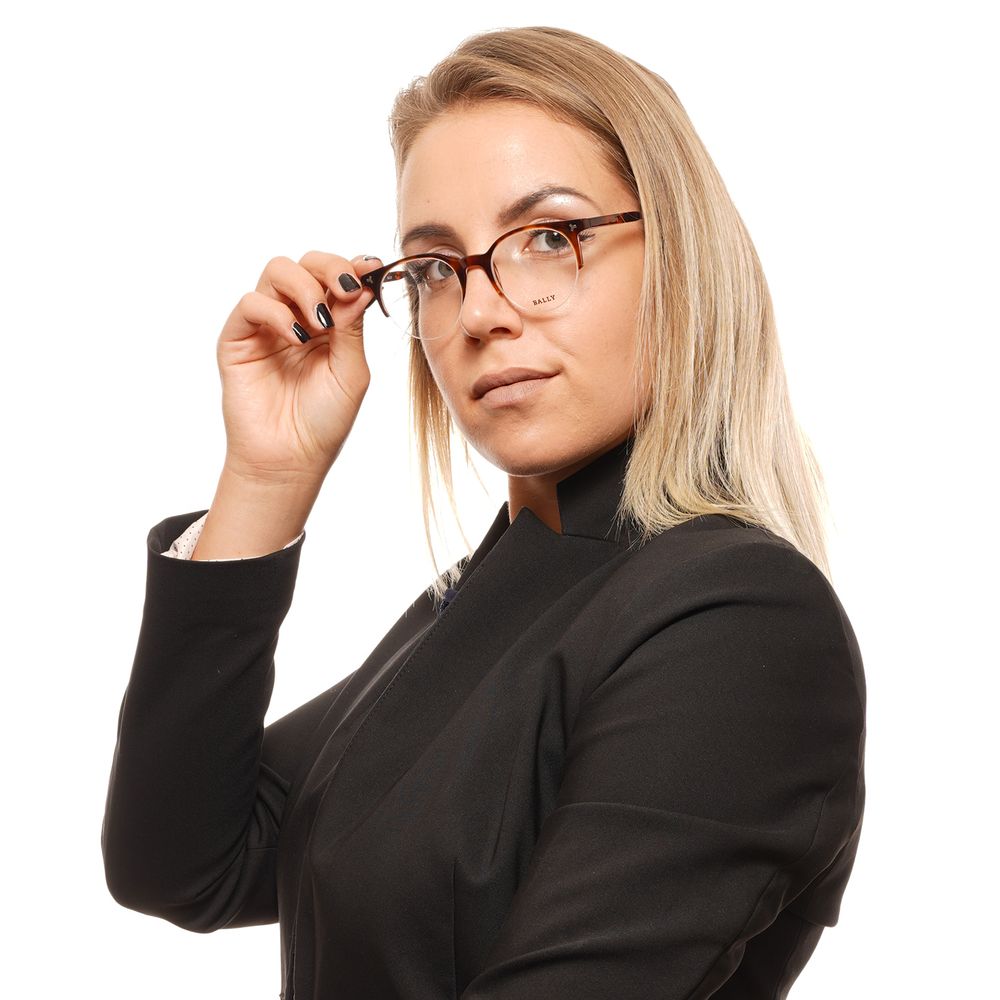 Woman wearing Bally Brown Unisex Glasses Frame in a stylish pose, highlighting the half-rim design and brown plastic material.