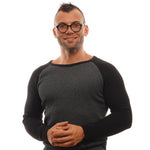 Man wearing Ermenegildo Zegna Brown Men Glasses Frame and gray sweater smiling at camera.