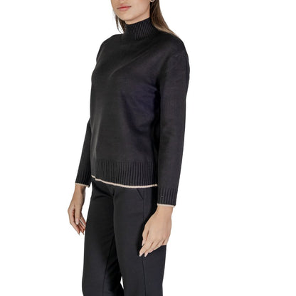 Woman wearing Street One Black Polyester Sweatshirt with high neckline and ribbed hem.