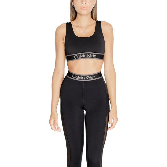 Calvin Klein Sport WO black sports bra and leggings with logo, seamless design, providing optimal support and comfort for fitness.