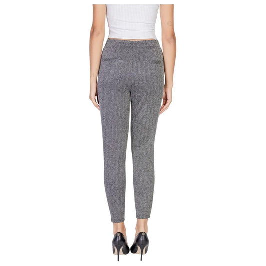 Woman wearing ICHI black polyester fall/winter pants from the back view, highlighting the sleek design and comfortable fit.