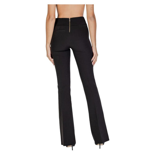 Back view of Sandro Ferrone black polyester women's pants from fall/winter collection, showcasing zipper and high-waist style.