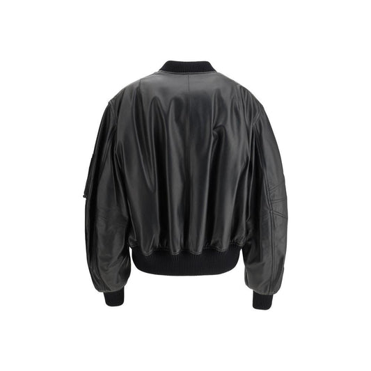 Back view of The Attico Leather Anja Bomber Jacket with ribbed hem, oversized fit, and zippered patch pocket on left sleeve.
