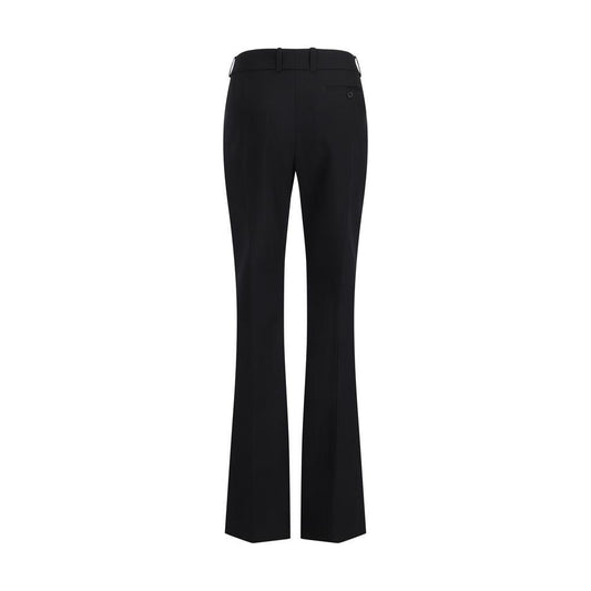 Back view of Alexander McQueen wool pants with monochrome pattern, leather patch, side and buttoned back pockets, and regular fit.