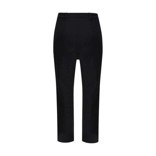 The Andamane boot-cut pants in black with zipper and button closure, featuring two front welt pockets and a regular fit.
