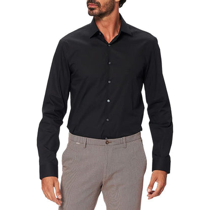 Calvin Klein Black Cotton Dress Shirt, men's slim fit stretch poplin, perfect for formal or casual occasions, model wearing in photo.