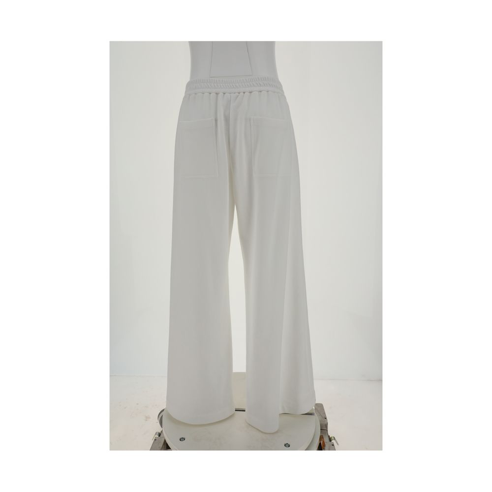 Brunello Cucinelli White Cotton Casual Pants with elastic waistband and side pockets, showcasing palazzo style elegance and comfort.