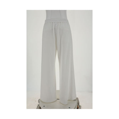 Brunello Cucinelli White Cotton Casual Pants with elastic waistband and side pockets, showcasing palazzo style elegance and comfort.