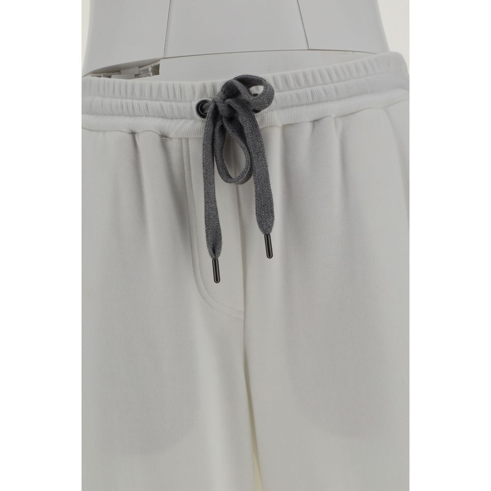 Brunello Cucinelli White Cotton Casual Pants with elasticated waistband and drawstring detail, featuring side pockets for elegance and comfort.