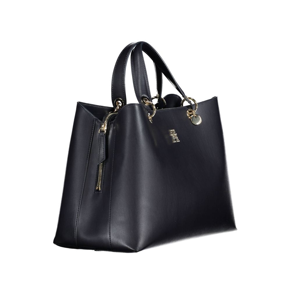 Front view with bag zipped and handles upright.