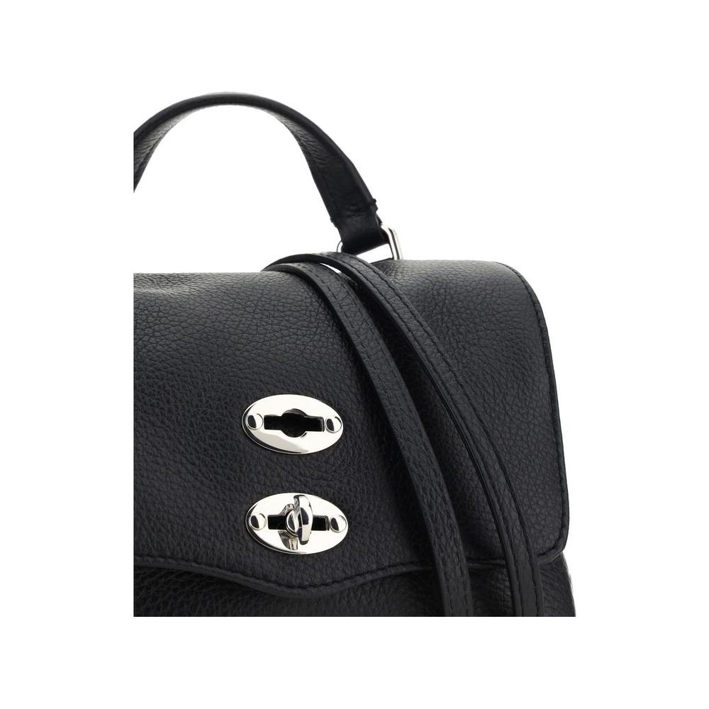 Front view with bag zipped and handles upright.