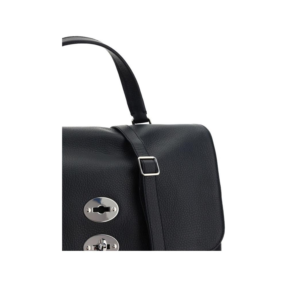 Front view with bag zipped and handles upright.