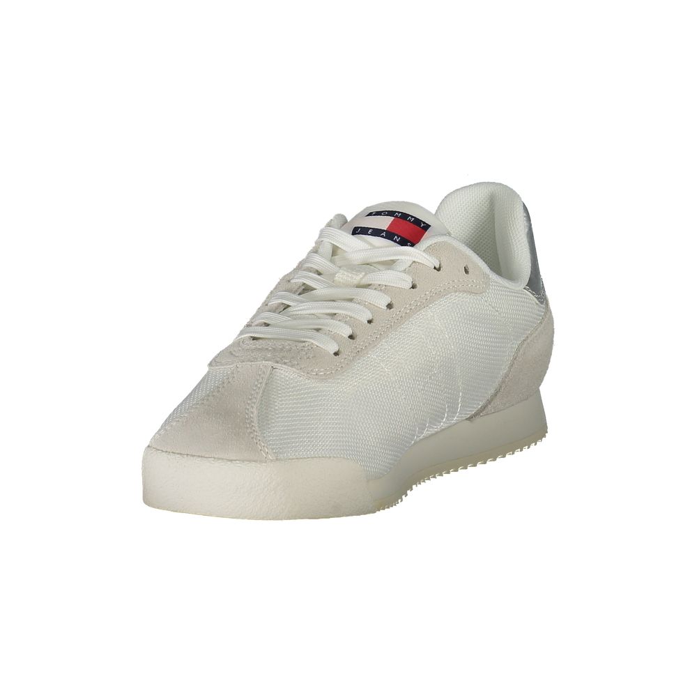 Tommy Hilfiger White Polyester Women Sneaker with lace-up design, eco-friendly construction, and bold logo detailing.
