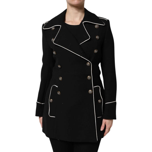 Dolce & Gabbana black wool double breasted blazer jacket with button closure, featuring white piping and high craftsmanship, front view