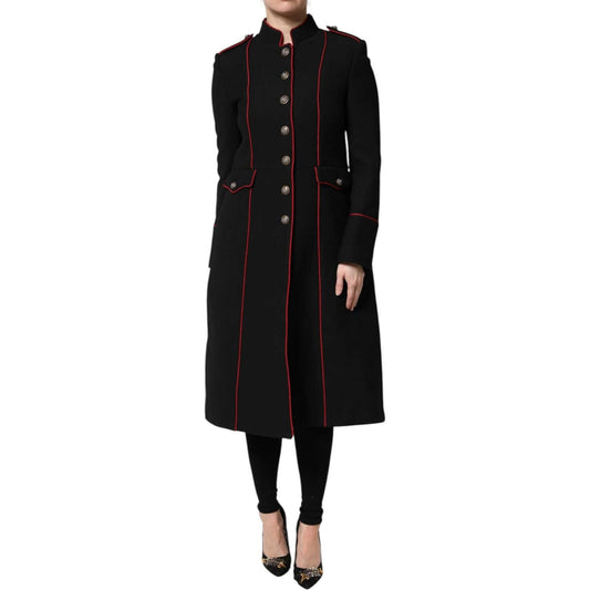Dolce & Gabbana black wool trench coat with red piping, button closure, and logo detail, showcasing Italian craftsmanship.