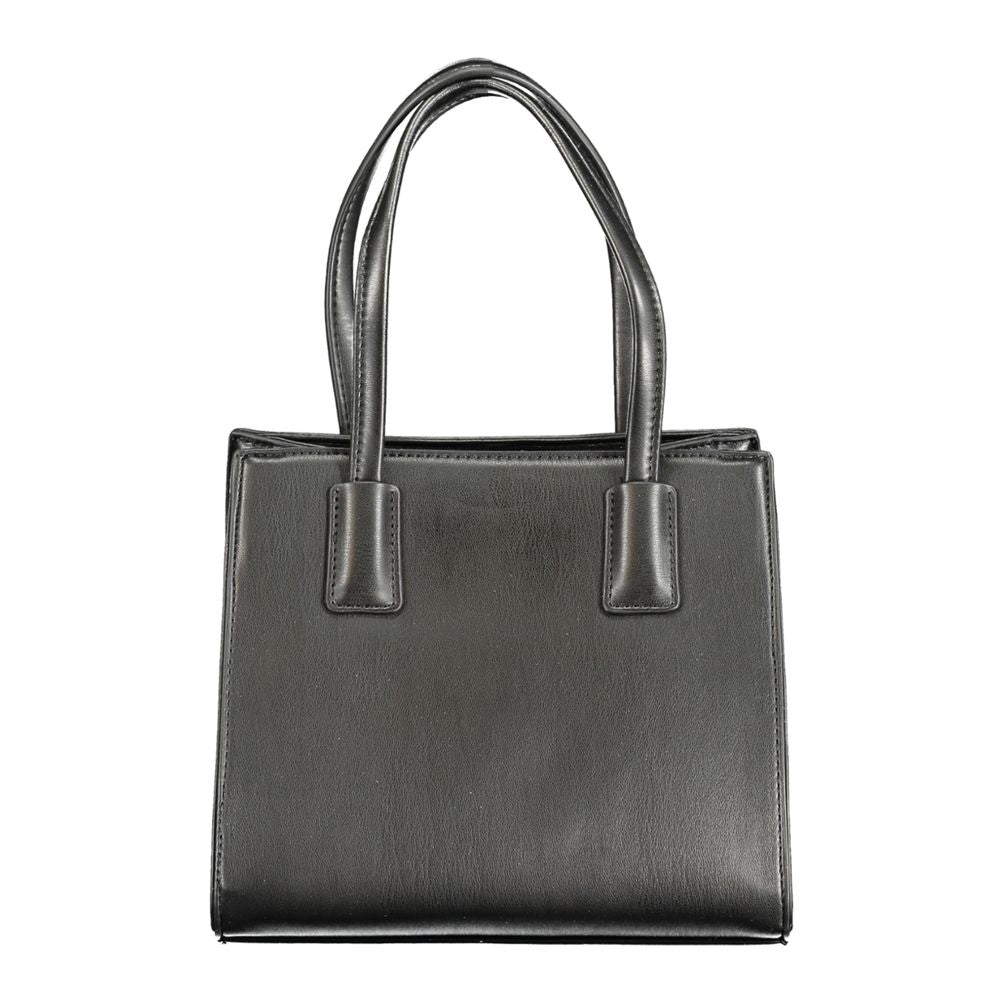 Front view with bag zipped and handles upright.