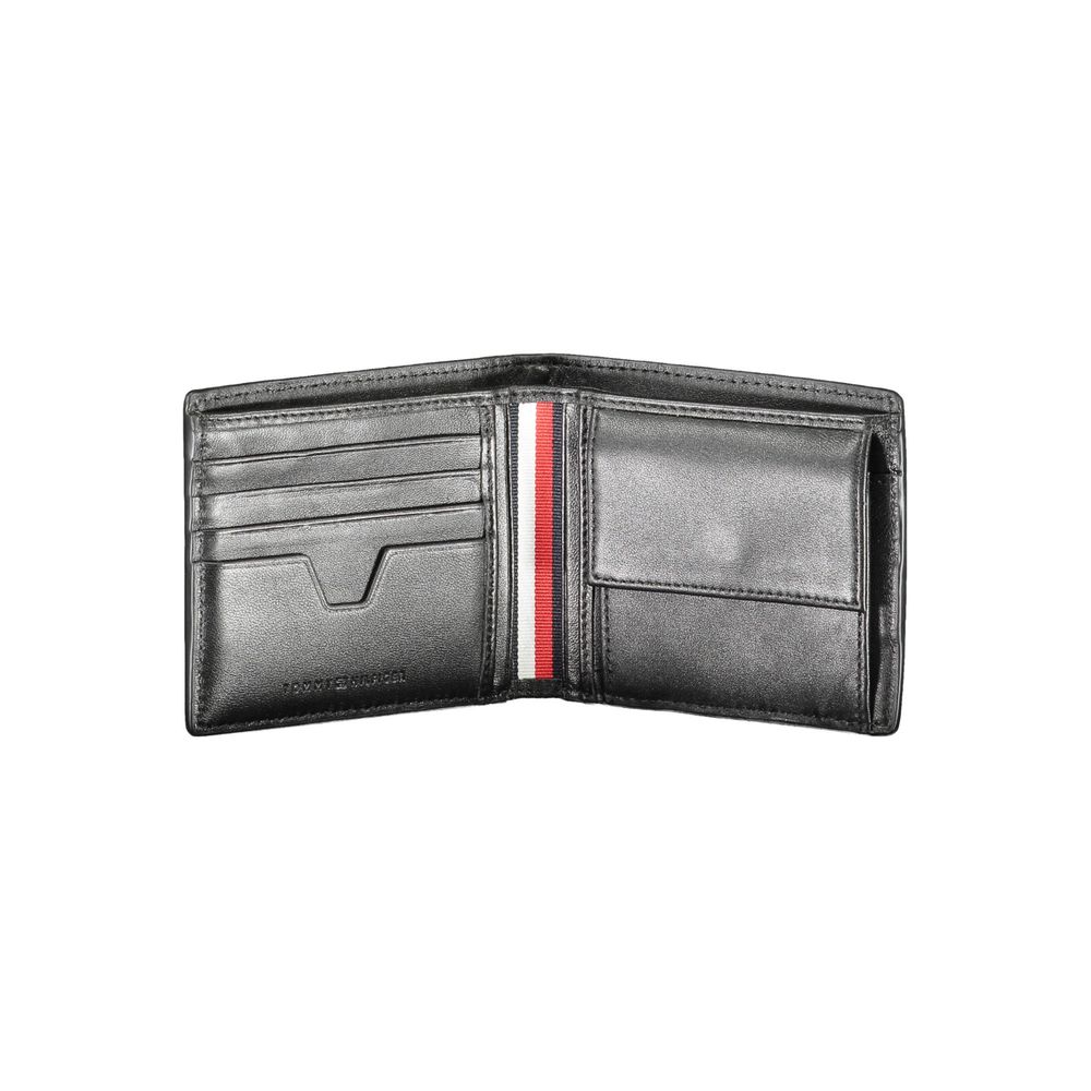 Open view of Tommy Hilfiger Black Leather Men Wallet with card slots and coin pouch, featuring the iconic logo and classic design.