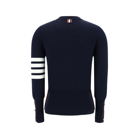 Back view of Thom Browne Virgin wool Sweater showcasing iconic horizontal bands and ribbed cuffs in navy blue.