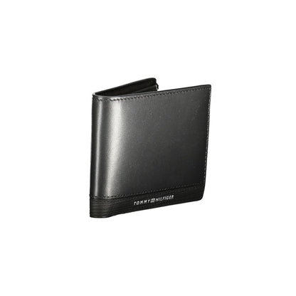 Tommy Hilfiger Black Leather Men Wallet with logo, stylish accessory with compartments and card slots.