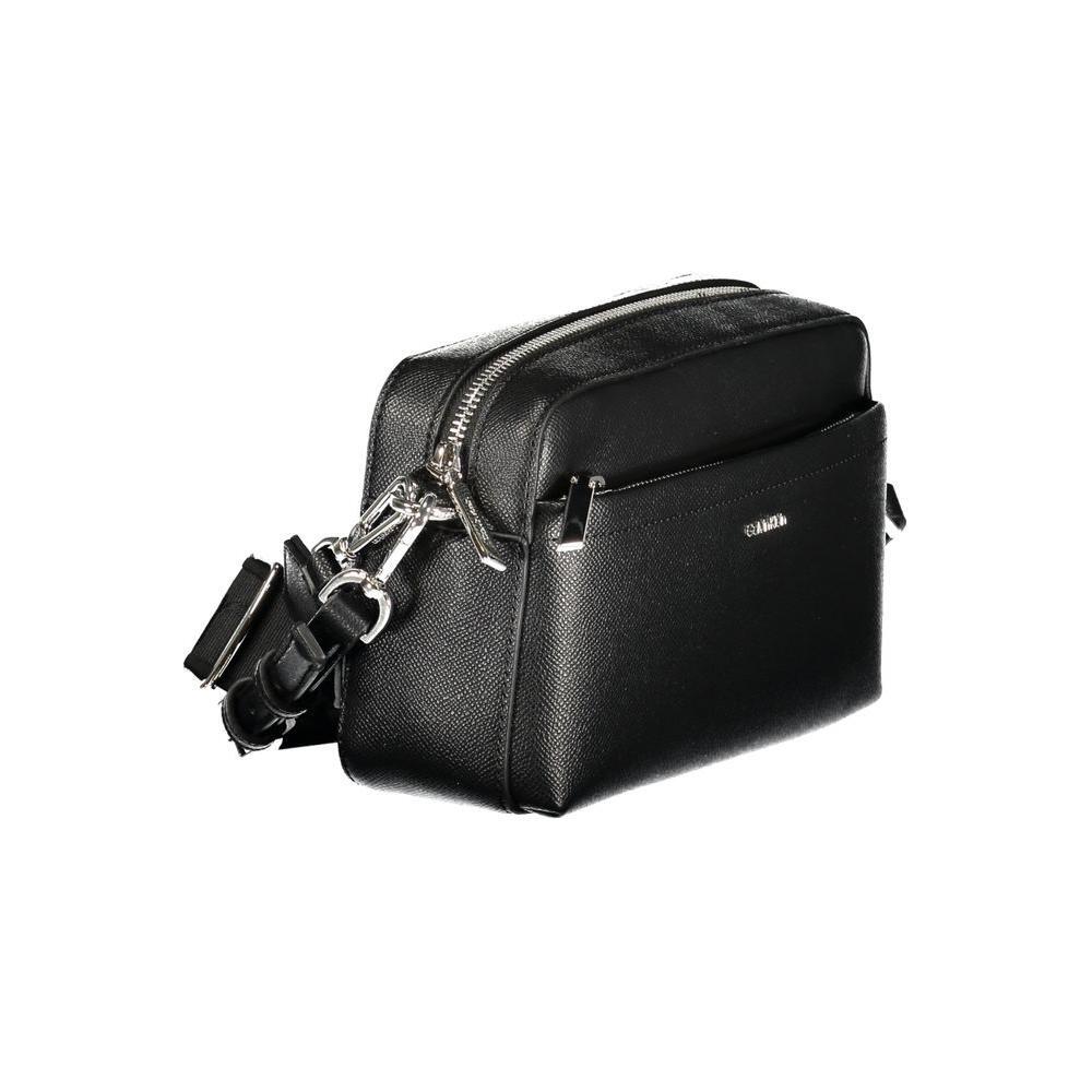 Front view with bag zipped and handles upright.
