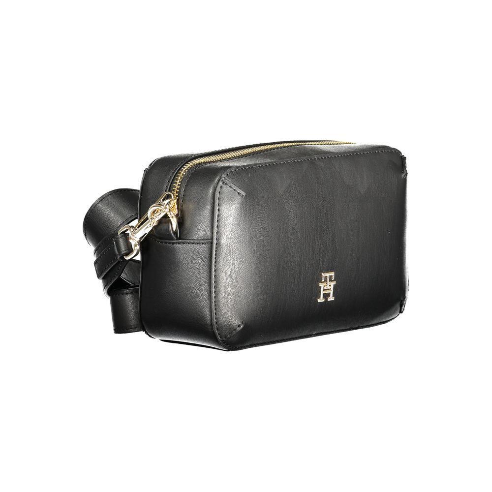 Front view with bag zipped and handles upright.