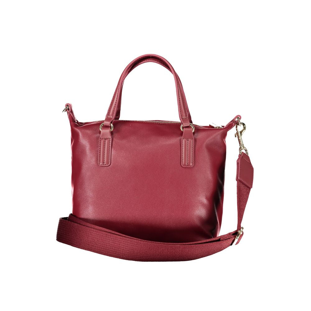 Tommy Hilfiger Red Polyester Handbag with adjustable strap and handles, featuring a zip closure and internal pocket.