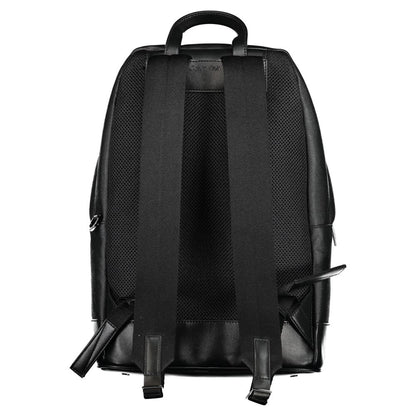Back view of Calvin Klein Black Polyester Backpack with adjustable straps, handle, and protective feet.