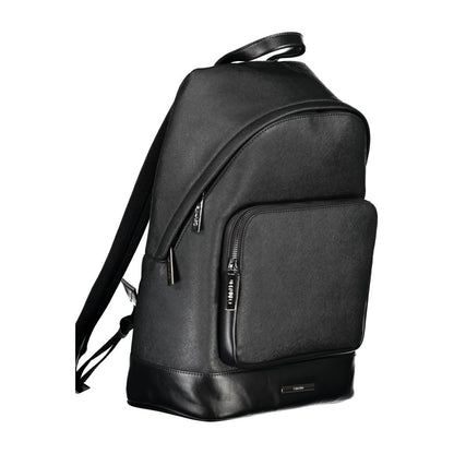 Calvin Klein Black Polyester Backpack with adjustable straps, external pocket, laptop compartment, and zip closure with logo detail.