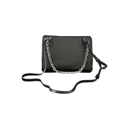 Calvin Klein Black Polyester Handbag with chain handle, adjustable strap, logo, and turn closure. Features compartments and card pocket.