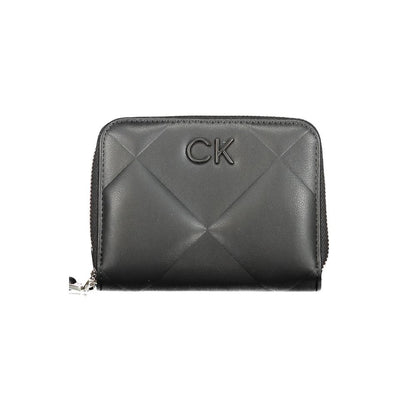 Calvin Klein Black Polyester Wallet with zip closure, logo, and contrasting details. RFID blocking feature, space for cards and coins.