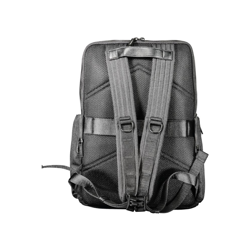 Back view of Calvin Klein Black Polyester Backpack with adjustable straps and external pockets.