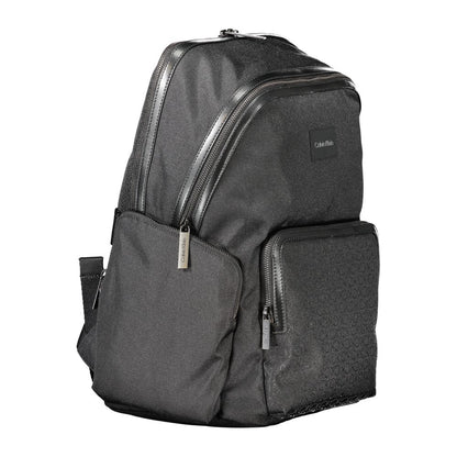 Calvin Klein Black Polyester Backpack with adjustable straps, multiple pockets, and laptop compartment. Made of 95% recycled polyester.