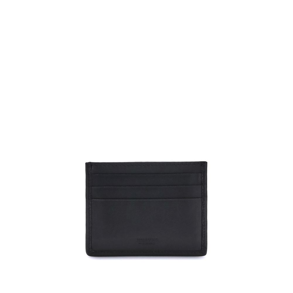 Ferragamo Black Calf Leather Bos Taurus Wallet with Gancini ornament, elegant and compact card holder AW25 season.